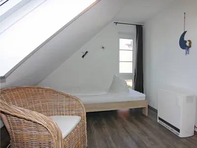 Ein Bett oder Betten in einem Zimmer der Unterkunft Reihenhaus Kleiner Steert in Friedrichskoog-Spitze