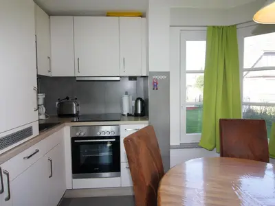 Küche/Küchenzeile in der Unterkunft Reihenhaus Kleiner Steert in Friedrichskoog-Spitze