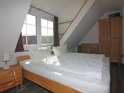 Ein Bett oder Betten in einem Zimmer der Unterkunft Reihenhaus Kleiner Steert in Friedrichskoog-Spitze