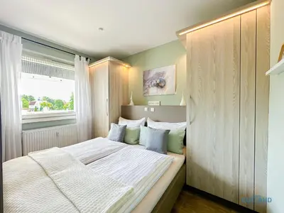 Ein Bett oder Betten in einem Zimmer der Unterkunft Hygge Zeit
