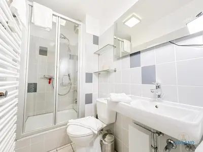 Ein Badezimmer in der Unterkunft Haus Pavillon Wohnung 5