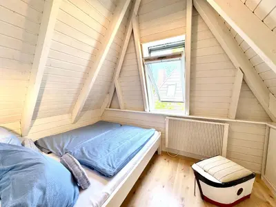 Ein Bett oder Betten in einem Zimmer der Unterkunft Dat Onnens Hus