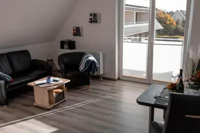 Ein Sitzbereich in der Unterkunft Noch ´ne Brise Wohnung 1 Trischen
