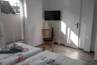 Ein Bett oder Betten in einem Zimmer der Unterkunft Noch ´ne Brise Wohnung 2 Tertius