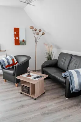 Ein Sitzbereich in der Unterkunft Noch ´ne Brise Wohnung 2 Tertius