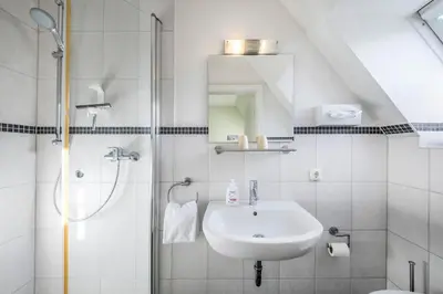 Ein Badezimmer in der Unterkunft Haus Regenpfeifer Wohnung 3