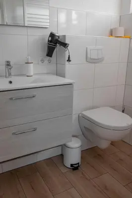 Ein Badezimmer in der Unterkunft Noch ´ne Brise Wohnung 3 Blauort