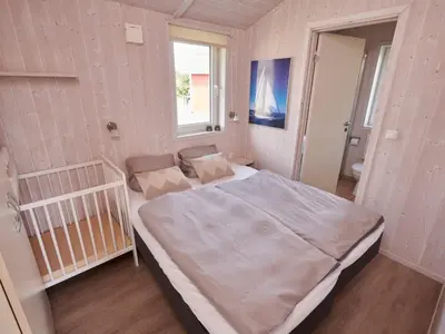 Ein Bett oder Betten in einem Zimmer der Unterkunft 4 star holiday home in FRIEDRICHKOOG