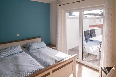 Ein Bett oder Betten in einem Zimmer der Unterkunft Penthouse-Wohnung