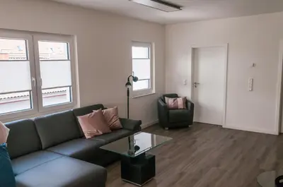Ein Sitzbereich in der Unterkunft Penthouse-Wohnung