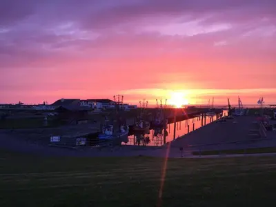 Blick auf den Sonnenuntergang/Sonnenaufgang von der Ferienwohnung aus oder aus der Nähe