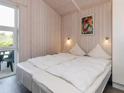 Ein Bett oder Betten in einem Zimmer der Unterkunft 4 star holiday home in FRIEDRICHKOOG