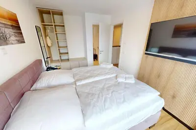 Ein Bett oder Betten in einem Zimmer der Unterkunft Zuhause In Duhnen - 303 - Neele