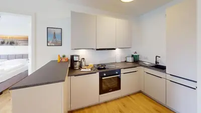 Küche/Küchenzeile in der Unterkunft Zuhause In Duhnen - 303 - Neele