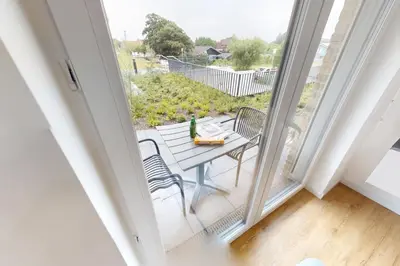 Ein Balkon oder eine Terrasse in der Unterkunft Zuhause In Duhnen - 303 - Neele
