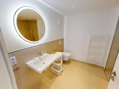Ein Badezimmer in der Unterkunft Zuhause In Duhnen - 213 Viel Meer