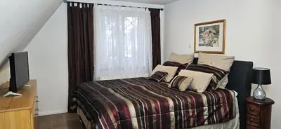 Ein Bett oder Betten in einem Zimmer der Unterkunft Ferienwohnung Drei Eichen
