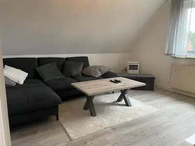 Ein Sitzbereich in der Unterkunft Ferienwohnung Altenwalde