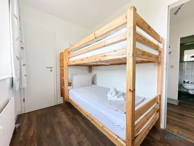 Ein Bett oder Betten in einem Zimmer der Unterkunft Watt n Blick 220