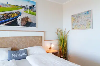 Ein Bett oder Betten in einem Zimmer der Unterkunft 