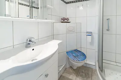 Ein Badezimmer in der Unterkunft 