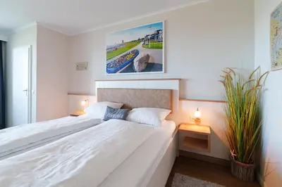 Ein Bett oder Betten in einem Zimmer der Unterkunft 