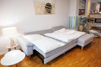Ein Bett oder Betten in einem Zimmer der Unterkunft PrimeLoft 