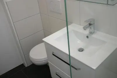Ein Badezimmer in der Unterkunft Frische Brise FeWo 02 09