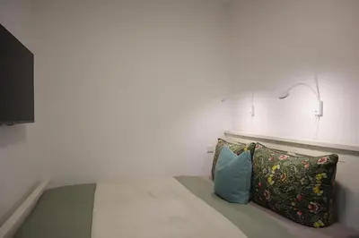 Ein Bett oder Betten in einem Zimmer der Unterkunft Deichbude 13