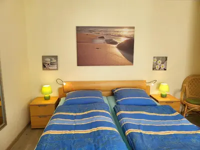 Ein Bett oder Betten in einem Zimmer der Unterkunft BUE - Friesenwinkel