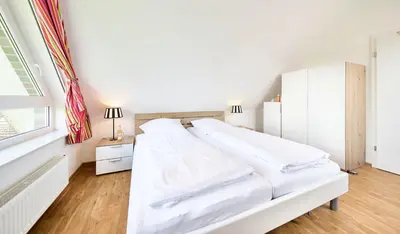 Ein Bett oder Betten in einem Zimmer der Unterkunft Saphir - 4