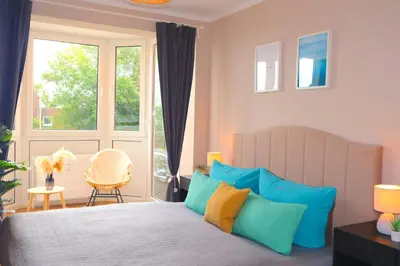 Ein Bett oder Betten in einem Zimmer der Unterkunft Ferienwohnung Sonnenwohnung