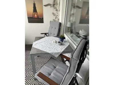 Ein Sitzbereich in der Unterkunft Dike crown in Haus Grimmershörn
