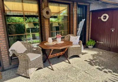 Ein Patio oder anderer Außenbereich in der Unterkunft Ferienwohnung Leuchtturmliebe Friedrichskoog - Spitze -