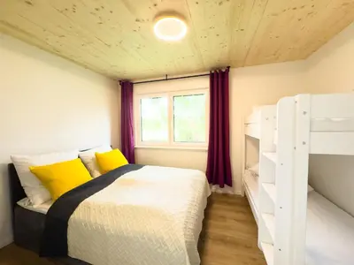 Ein Bett oder Betten in einem Zimmer der Unterkunft LieblingsKOOG