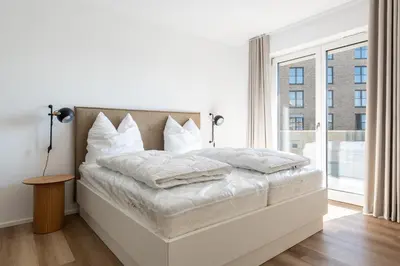 Ein Bett oder Betten in einem Zimmer der Unterkunft Ferienwohnung Lichtblick