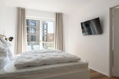 Ein Bett oder Betten in einem Zimmer der Unterkunft Ferienwohnung Lichtblick