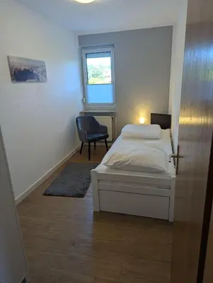 Ein Bett oder Betten in einem Zimmer der Unterkunft Nige Ooge FeWo 9