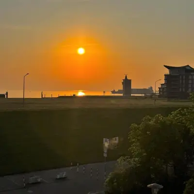 Blick auf den Sonnenuntergang/Sonnenaufgang von der Ferienwohnung aus oder aus der Nähe