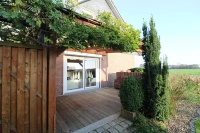 Ein Garten an der Unterkunft Ferienhaus Küstenkind