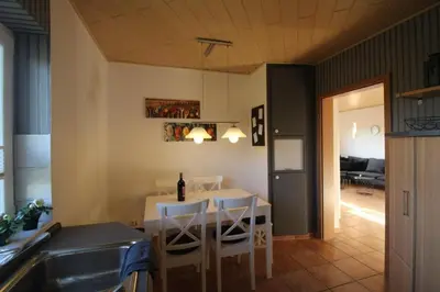 Ein Sitzbereich in der Unterkunft Ferienhaus Küstenkind