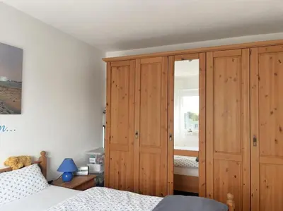 Ein Bett oder Betten in einem Zimmer der Unterkunft Ferienwohnung Nordseewellen, App 16