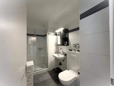 Ein Badezimmer in der Unterkunft Ferienwohnung Nordseewellen, App 16