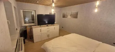 Ein Bett oder Betten in einem Zimmer der Unterkunft Gemütliches Ferienhaus im Herzen von Cuxhaven