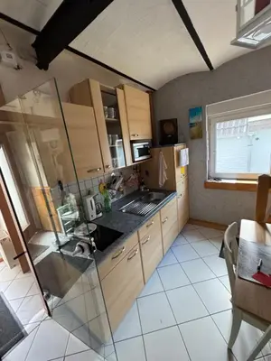 Küche/Küchenzeile in der Unterkunft Gemütliches Ferienhaus im Herzen von Cuxhaven