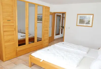Ein Bett oder Betten in einem Zimmer der Unterkunft Haus Nordseeblick, App 04