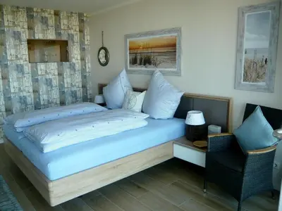 Ein Bett oder Betten in einem Zimmer der Unterkunft Haus Nordseeblick, App 20