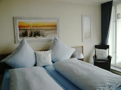 Ein Bett oder Betten in einem Zimmer der Unterkunft Haus Nordseeblick, App 20
