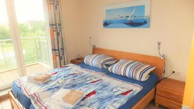 Ein Bett oder Betten in einem Zimmer der Unterkunft Haus Nordseeblick, App 22