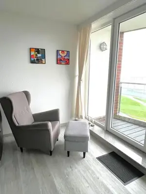Ein Sitzbereich in der Unterkunft Haus Nordseeblick, App 26